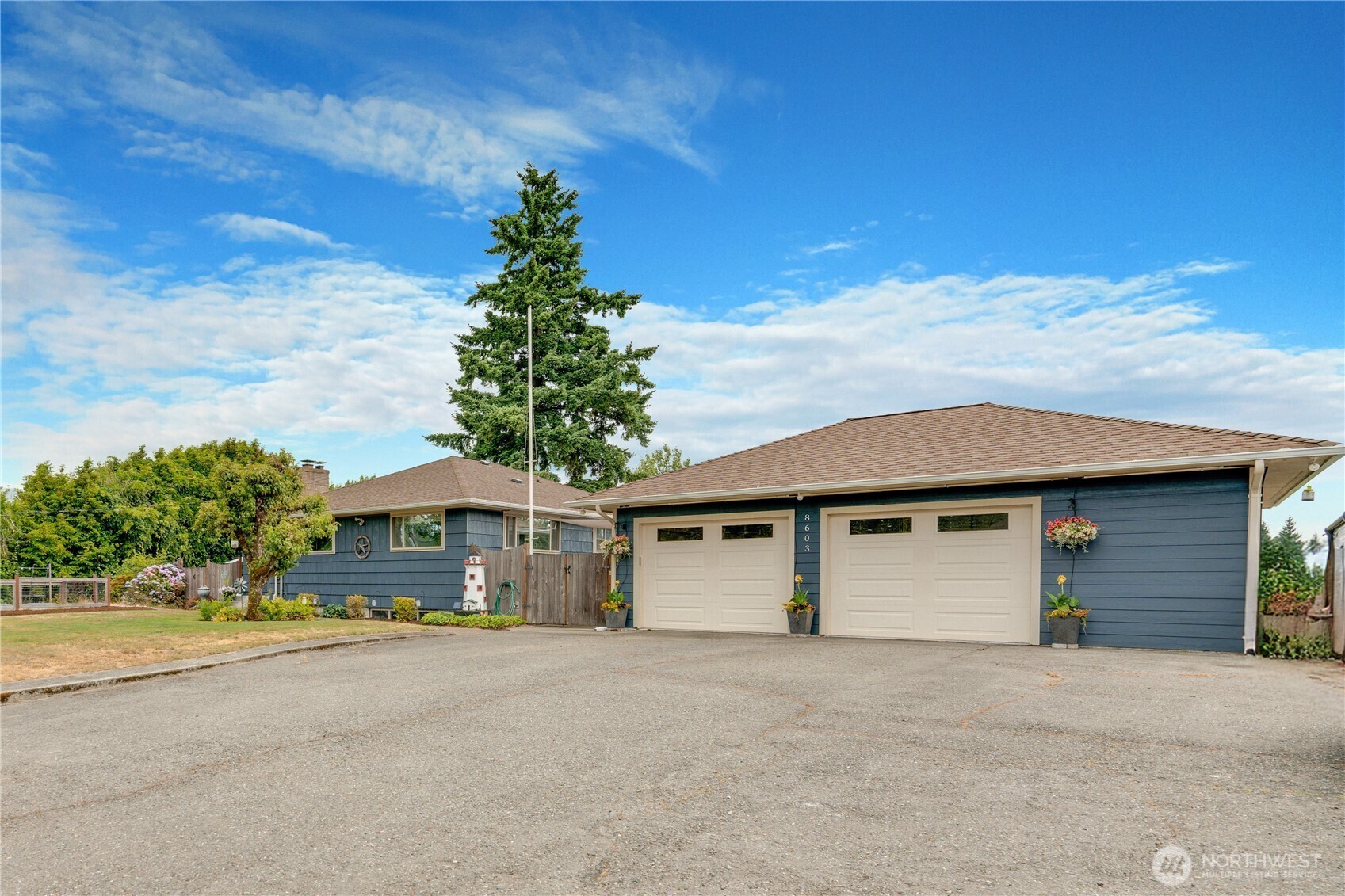 Property Photo:  8603  Woodland Avenue E  WA 98371 