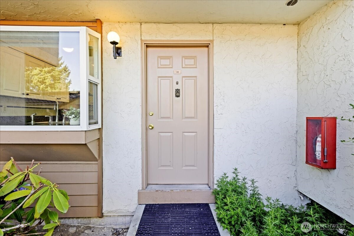 Property Photo:  12828 SE 41st Lane C-103  WA 98006 