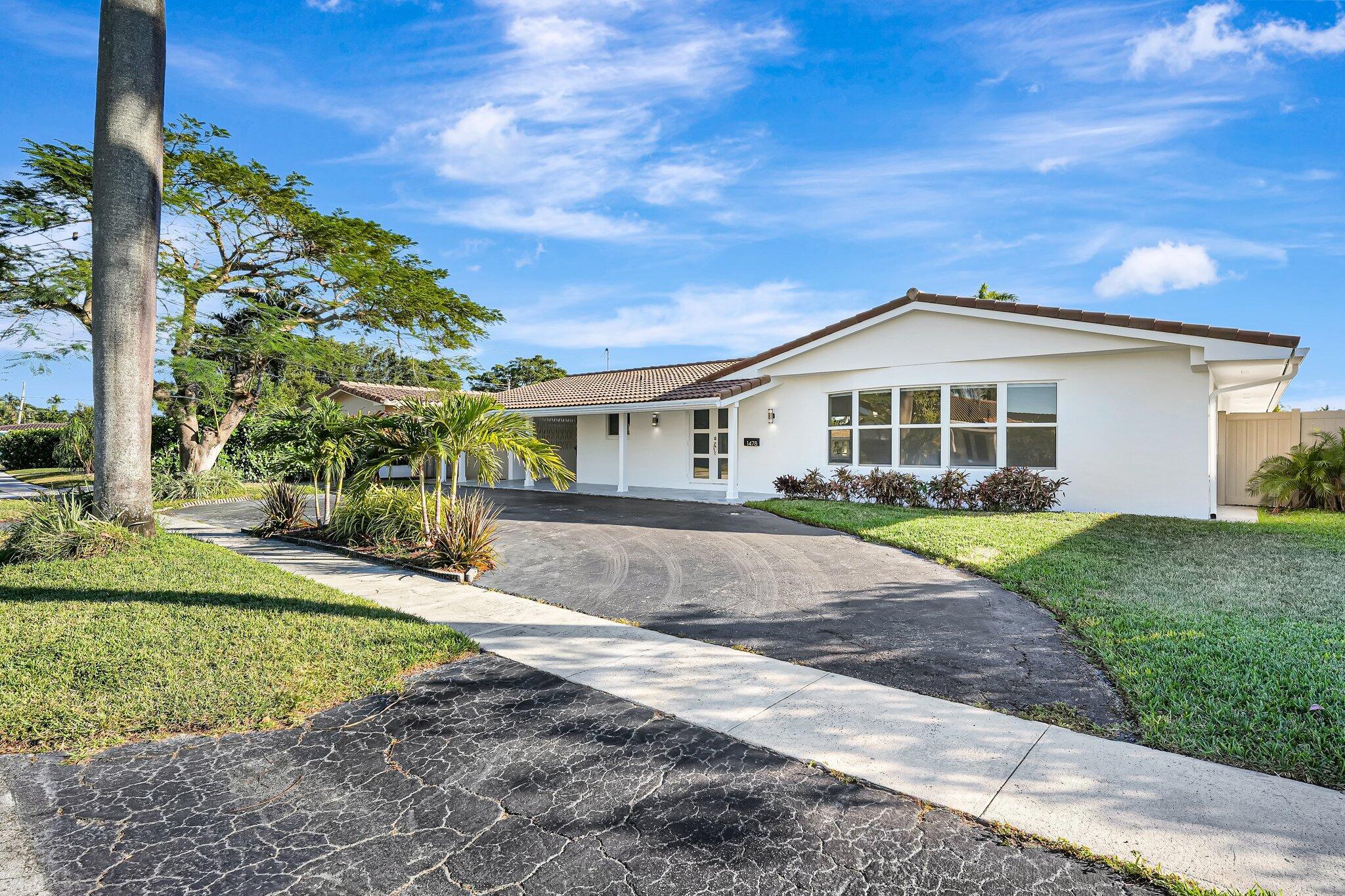 Property Photo:  1478 NE 57th Court  FL 33334 