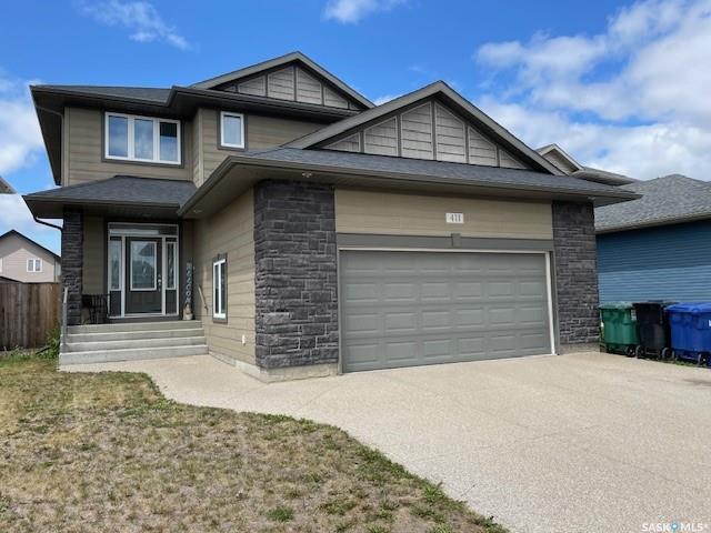 Property Photo: 411 Langlois Way SK S7T 0M9