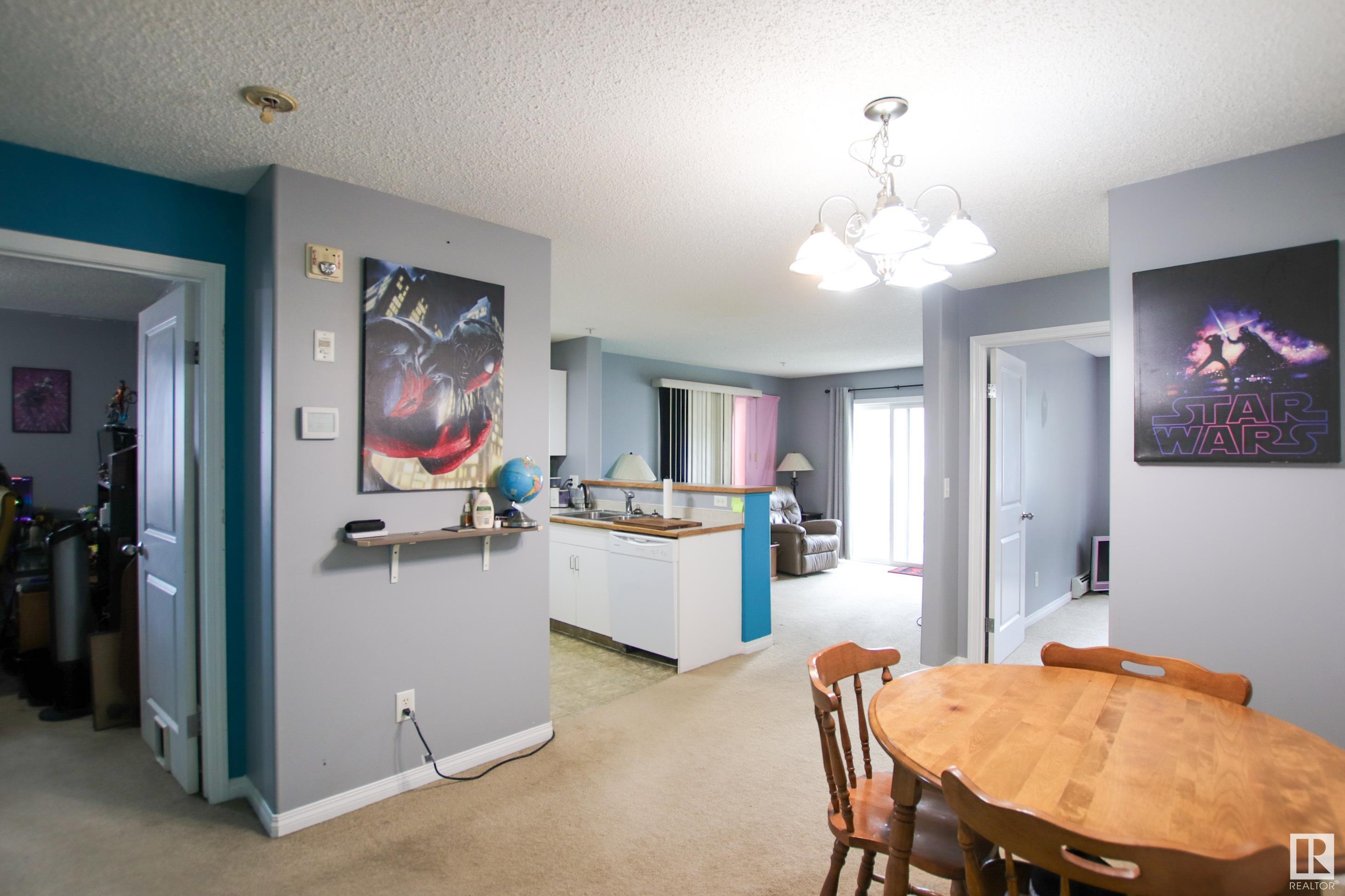 Property Photo:  14708 50 Street NW 103  AB T5A 5G9 