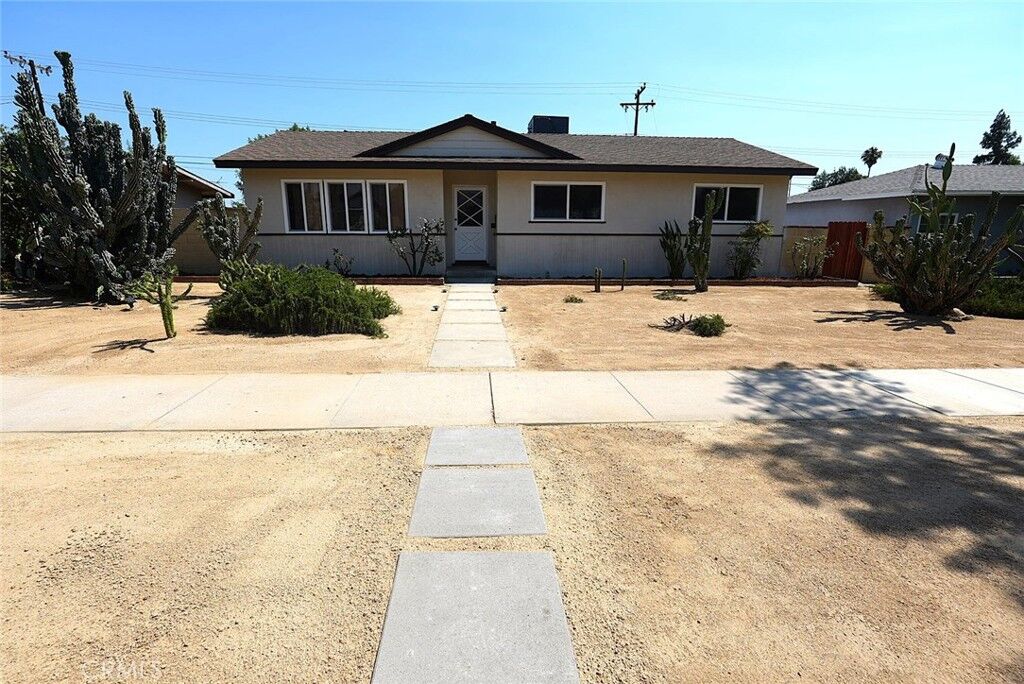 Property Photo:  938 E Lugonia Avenue  CA 92374 