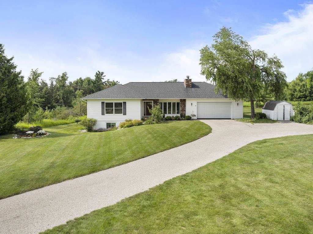 Property Photo:  3611 Country Club  MI 49770 