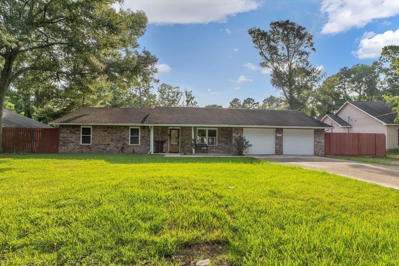 Property Photo: 22106 Sandalwood Street TX 77365