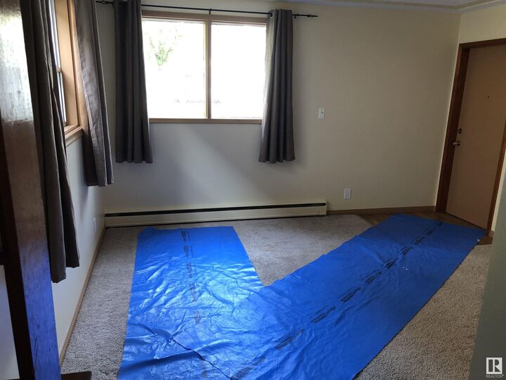 Property Photo:  10742 106 Street NW  AB T5H 2X9 