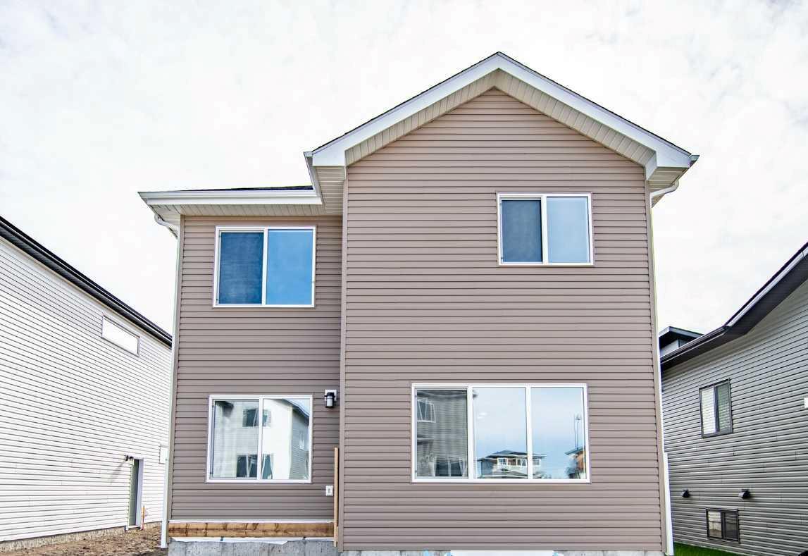 Property Photo:  104 Emerald Drive  AB T4P 3G8 