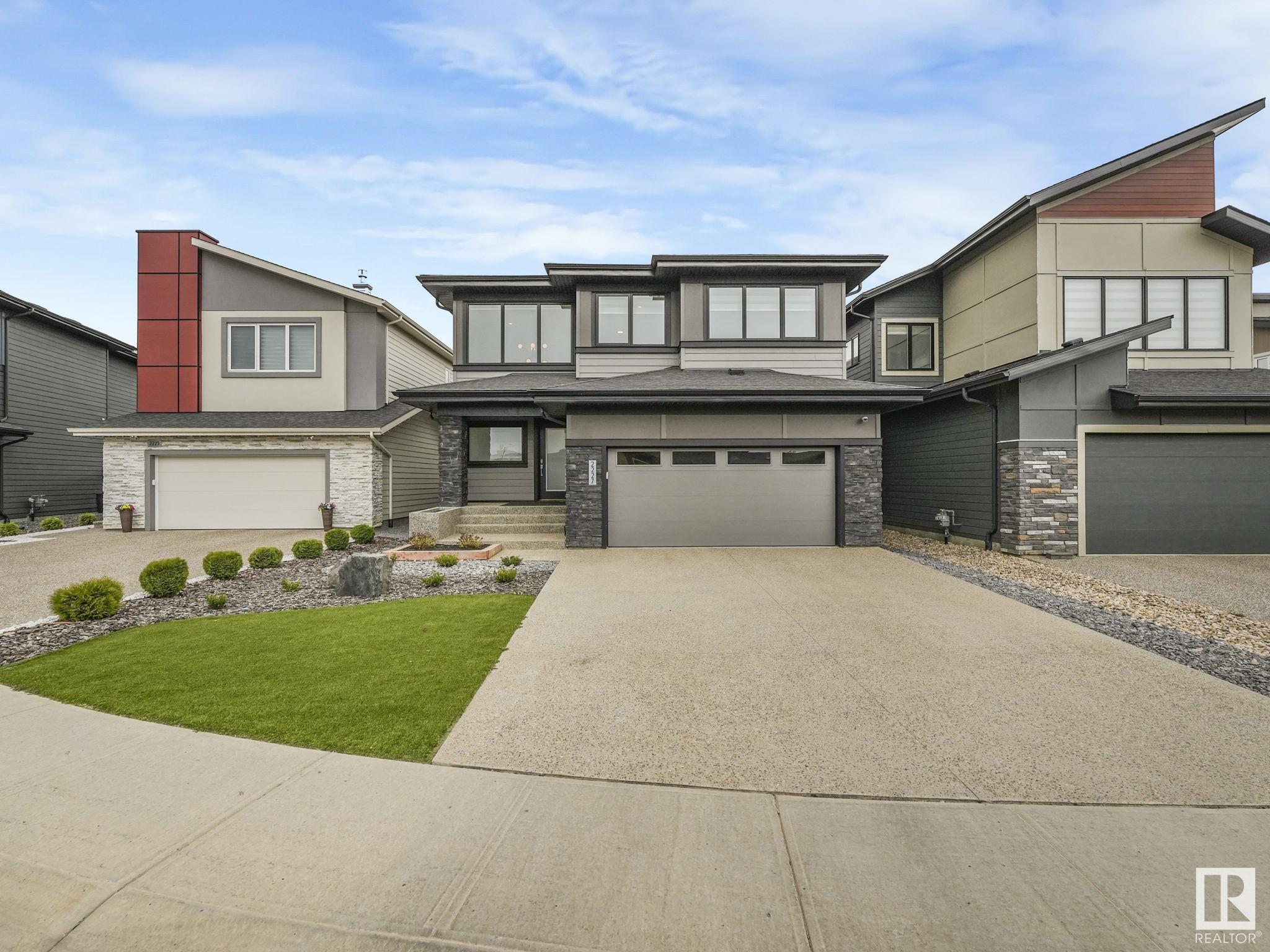 Property Photo: 2227 Kelly Crescent SW AB T6W 3R8
