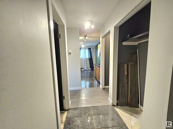 Property Photo:  12929 127 Street NW 101  AB T5L 1B1 