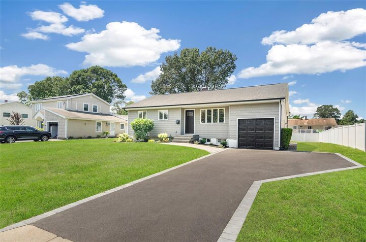 Property Photo:  498 Belmore Avenue  NY 11752 