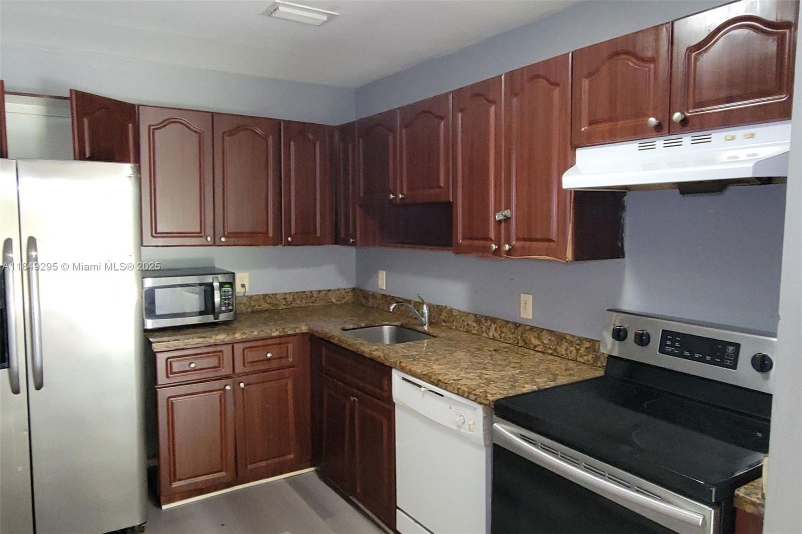 Property Photo: 1075 NW 124th St FL 33168