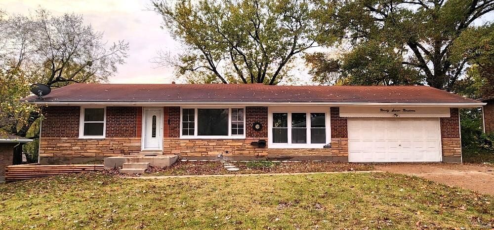 Property Photo: 9719 Griffin Drive MO 63137