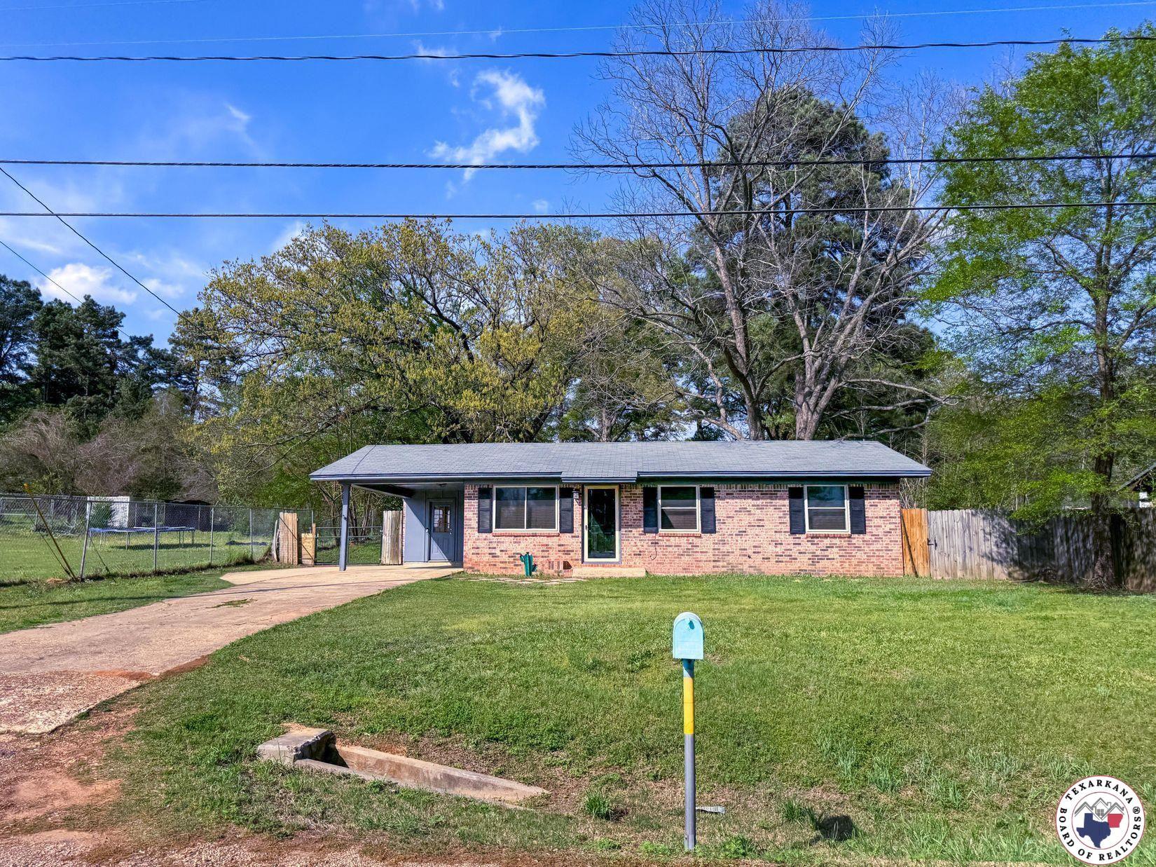 Property Photo: 308 West Lanark Street TX 75572