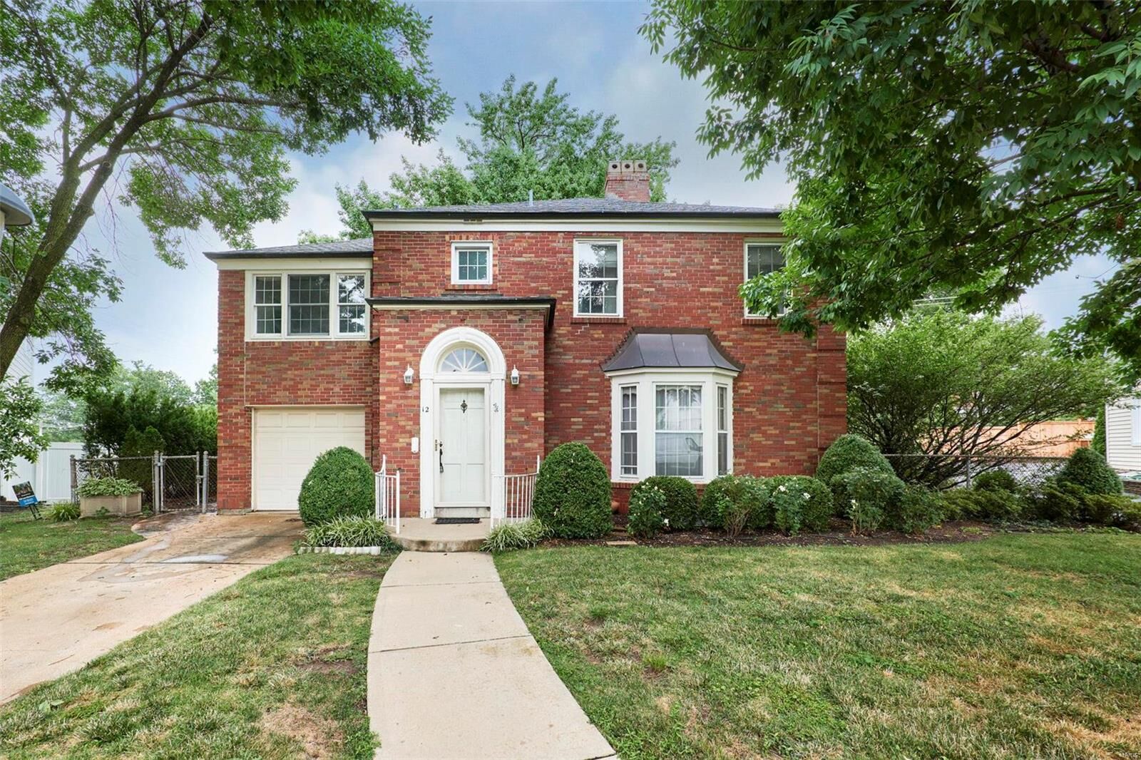 Property Photo:  12 Hanley Downs  MO 63117 