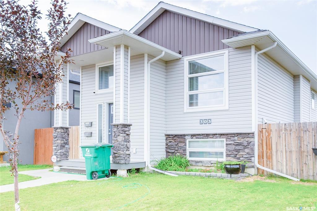 Property Photo: 303 Rosewood Boulevard W SK S7V 0G8