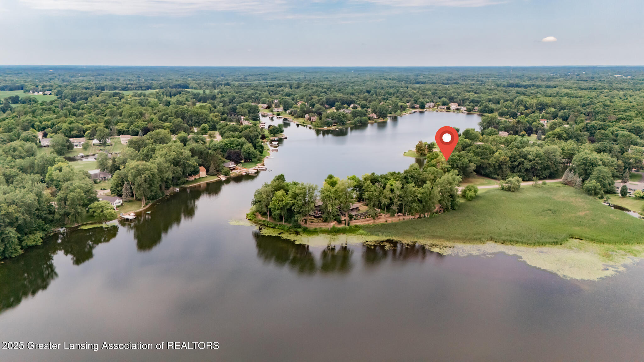Property Photo:  10082 Oak Island Drive  MI 48848 