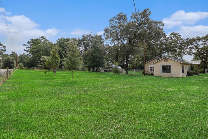 Property Photo: 14145 Bert Brown Rd TX 77302