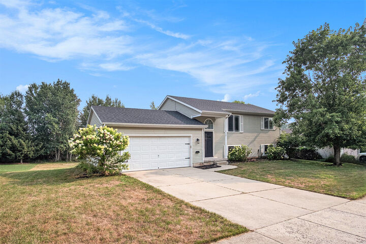 Property Photo: 4139 Whirlwind Drive NE MI 49341