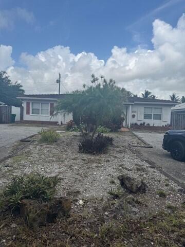 Property Photo:  13791 Oleander Avenue  FL 33408 