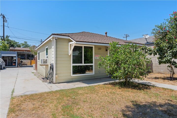 Property Photo: 13207 S Carlton Avenue CA 90061