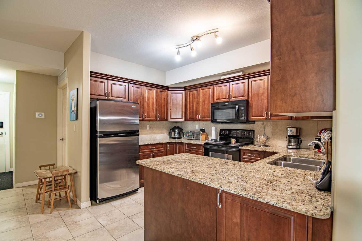 Property Photo: 69 Ironstone 408 AB T4R 0J9