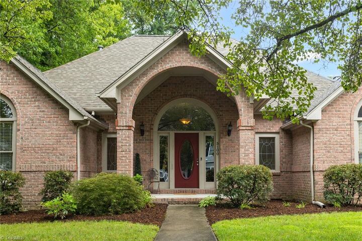 Property Photo:  5100 Birnamwood Trail  NC 27407 