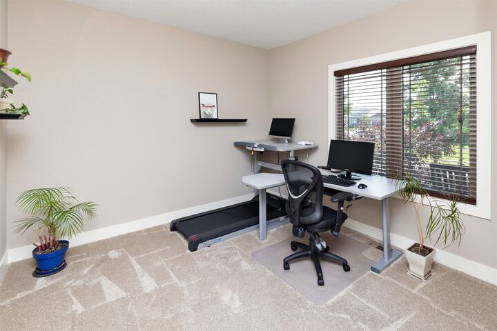 Property Photo:  312 NE Pinehurst Circle  IA 50021 