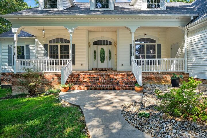 Property Photo:  12 Ellerman Oaks Court  MO 63348 