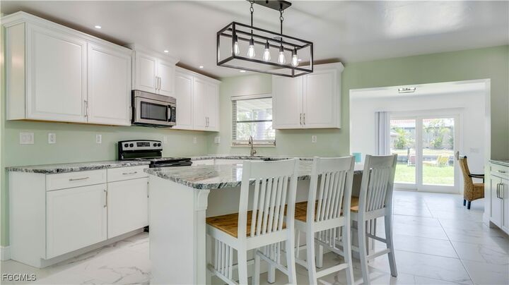 Property Photo:  2708 Mangrove Street  FL 33956 