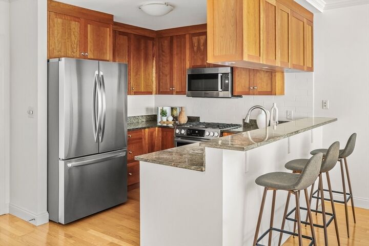 Property Photo:  2-14 Saint Paul St 311  MA 02446 