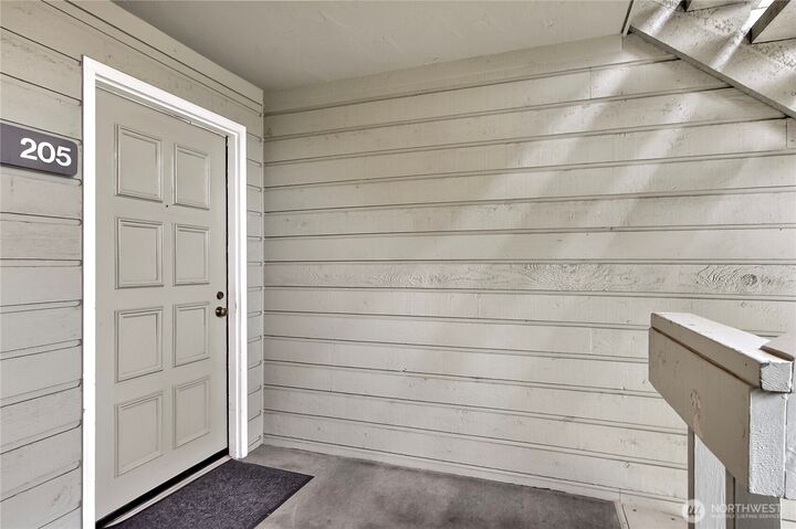 Property Photo:  22211  6th Avenue S 205  WA 98198 
