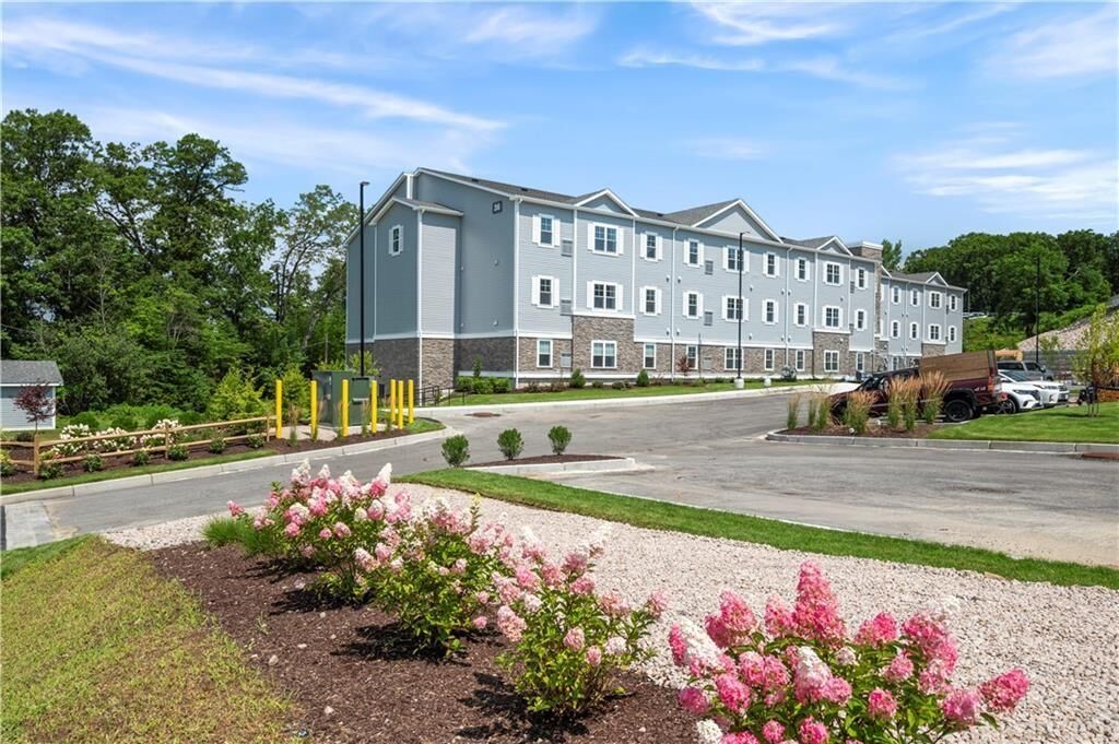 Property Photo: 36 Old Louisquisset Pike 103 RI 02896