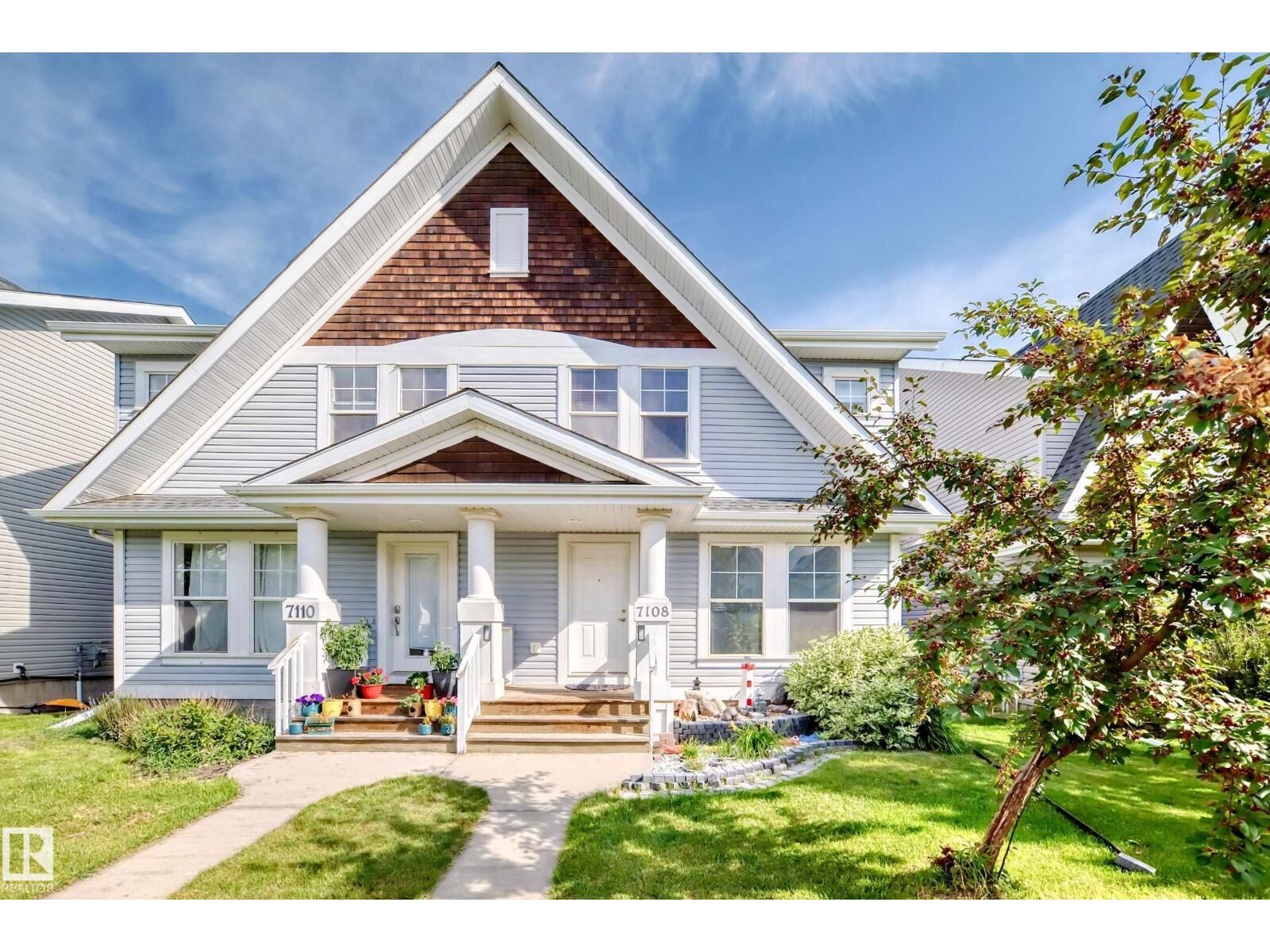 Property Photo:  7108 16 Av SW  AB T6X 0H3 