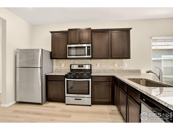 Property Photo:  308 Bowles St  CO 80643 
