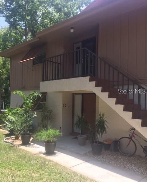 Property Photo:  100 Sweetgum Woods Court 2D  FL 32725 