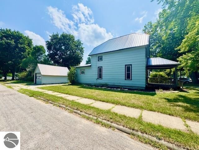 Property Photo:  730 N River  MI 48801