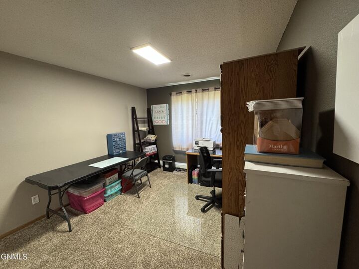 Property Photo:  2723 Gateway Avenue 1  ND 58503 