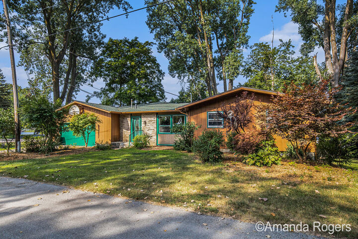 Property Photo:  4365 Bedaki Avenue NE  MI 49331 