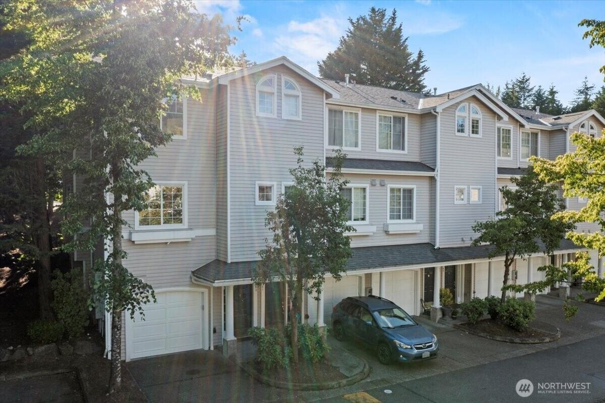Property Photo:  1980  132nd Avenue SE 40  WA 98005 