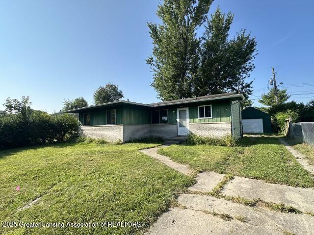 Property Photo:  3619 Coachlight Common Street  MI 48911 