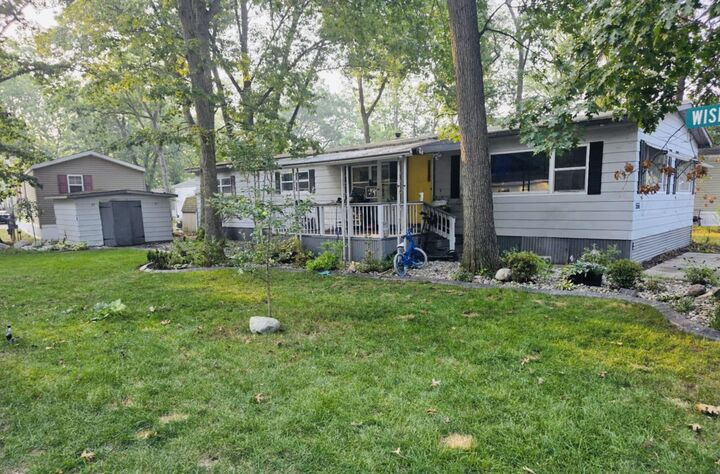 Property Photo:  556 S Macintosh Lane  MI 49442 