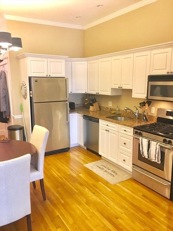 Property Photo:  439 W 4th 1  MA 02127 