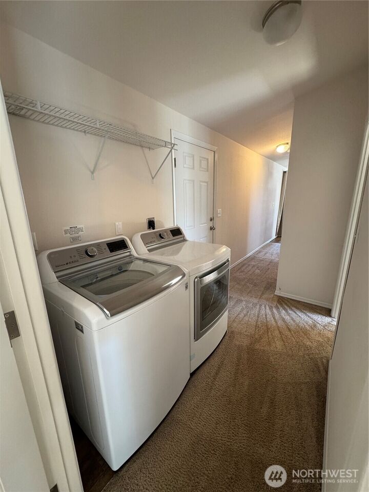 Property Photo:  210  37th Street SE 64  WA 98002 