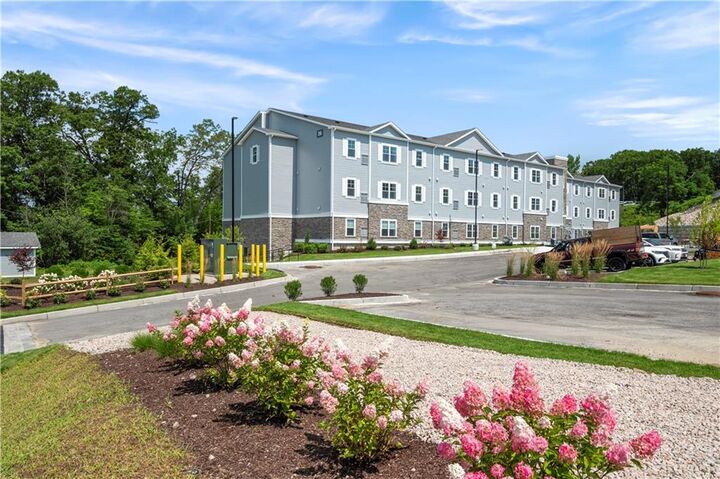 Property Photo: 36 Old Louisquisset Pike 108 RI 02896