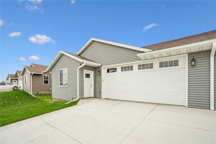 Property Photo: 203 William Way IA 52315