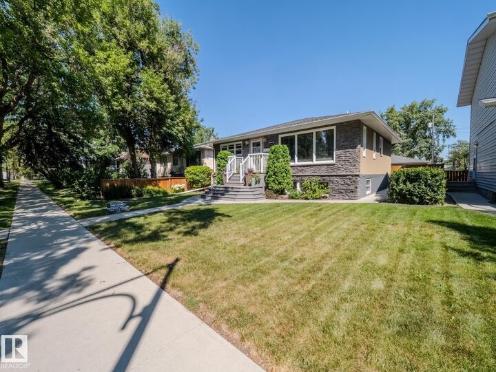 Property Photo:  10823 122 Street NW  AB T5M 0A5 