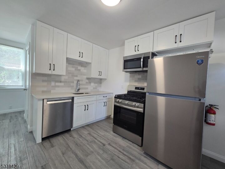 Property Photo:  128 Turnpike First Floor  NJ 07440 