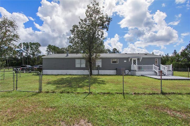 Property Photo:  36401 Ranch Road  FL 32736 