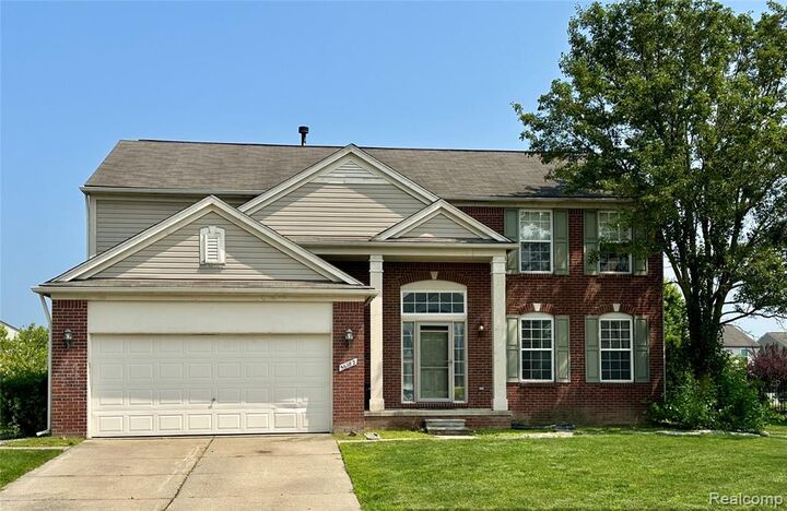 Property Photo:  56782 Inland Court  MI 48042 1189 