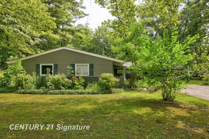 Property Photo:  1556 Sullivan Drive  MI 48638 