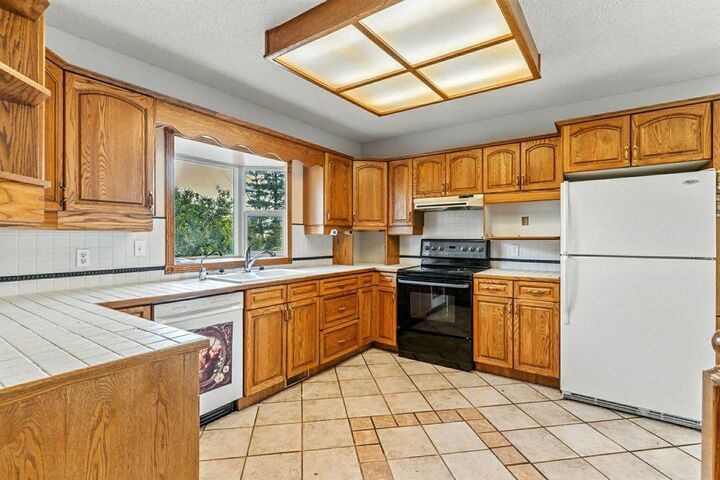 Property Photo: 290003 96 Street E AB T1S 3Y9